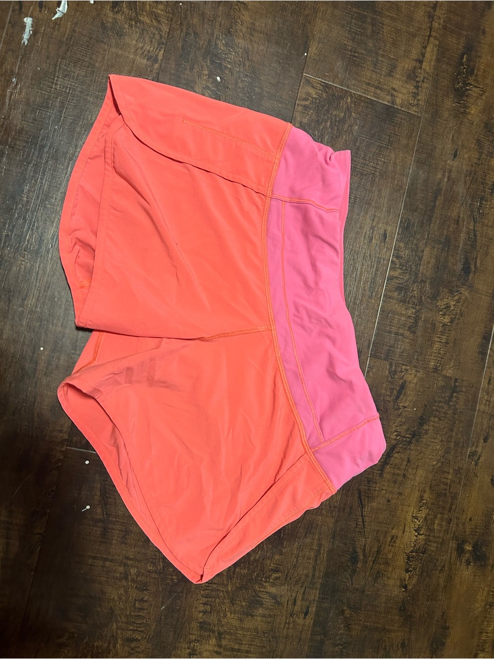 Lululemon coral and pink running shorts